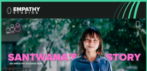 An image of a teacher standing outside with trees in the backdrop with the text 'Santwana's Story'